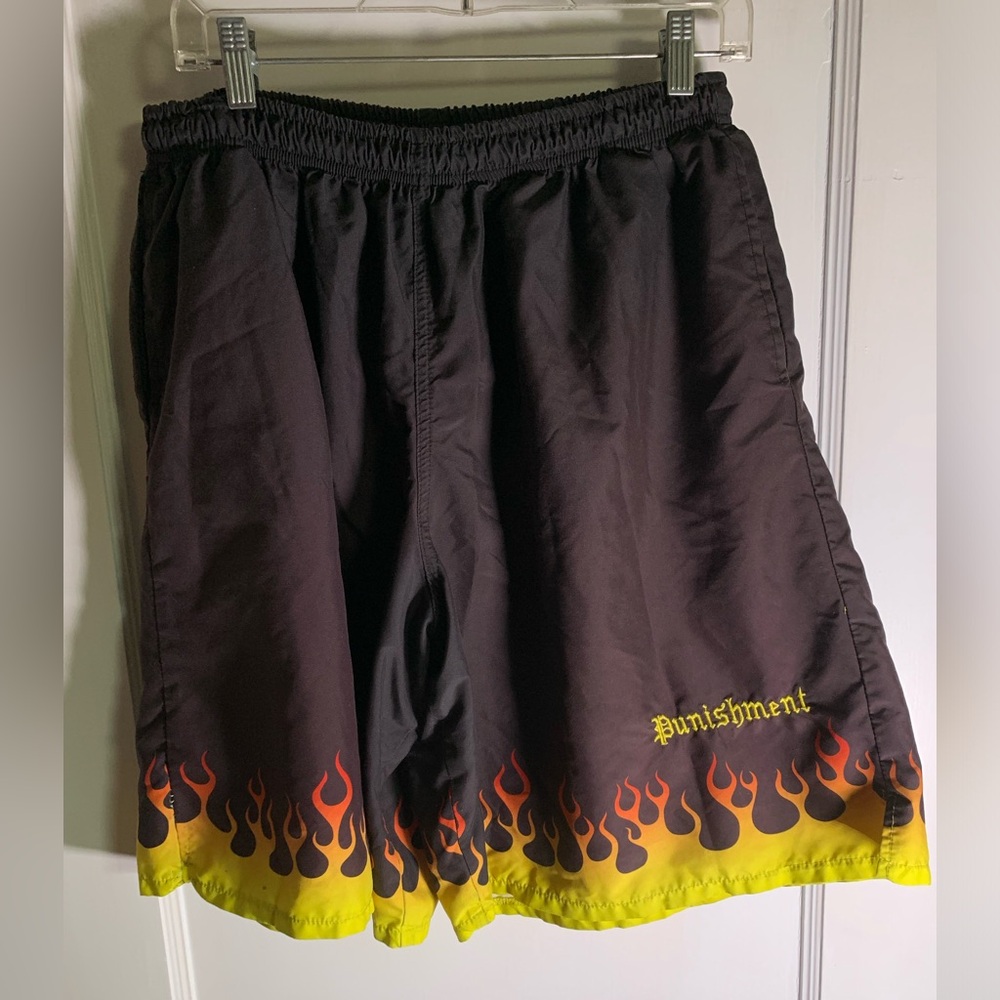 Y2K Tito Ortiz punishment flame shorts